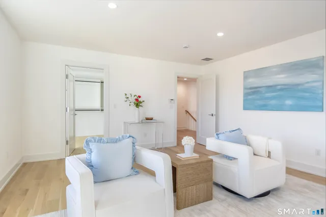 a living room with furniture and a couch