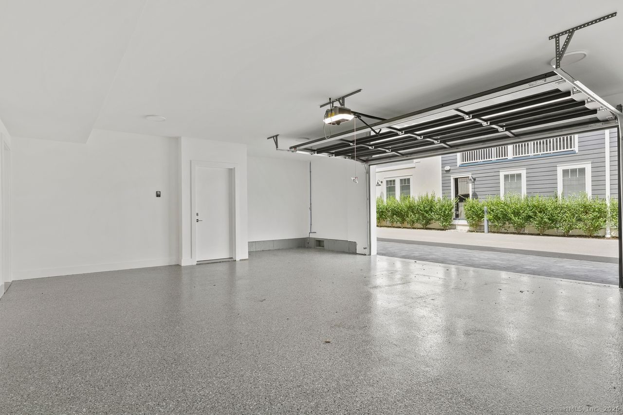 345 Reef Road, Unit B6 Fairfield, CT 06824 - Photo 8 of 40 a view of a garage
