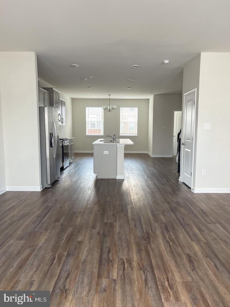 7066 Delegate Place Frederick, MD 21703 - Photo 11 of 25 a view of a living room with windows