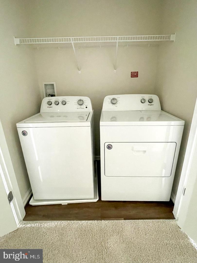 7066 Delegate Place Frederick, MD 21703 - Photo 16 of 25 a utility room with dryer and washer