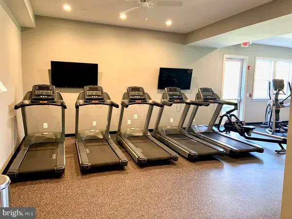 a view of a room with gym equipment
