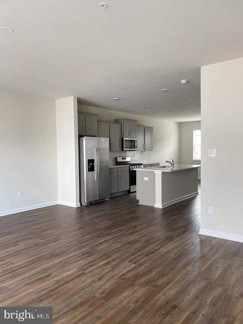 7066 Delegate Place Frederick, MD 21703 - Photo 7 of 25 a view of kitchen with wooden floor