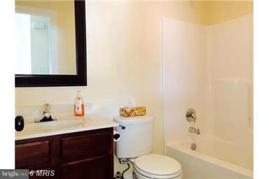 28 Job Road Inwood, WV 25428 - Photo 14 of 15 a bathroom with a sink and a mirror