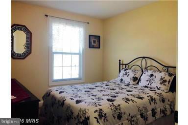 28 Job Road Inwood, WV 25428 - Photo 8 of 15 a bedroom with a bed and a window