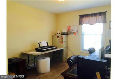 28 Job Road Inwood, WV 25428 - Photo 9 of 15 a room with a table and a window