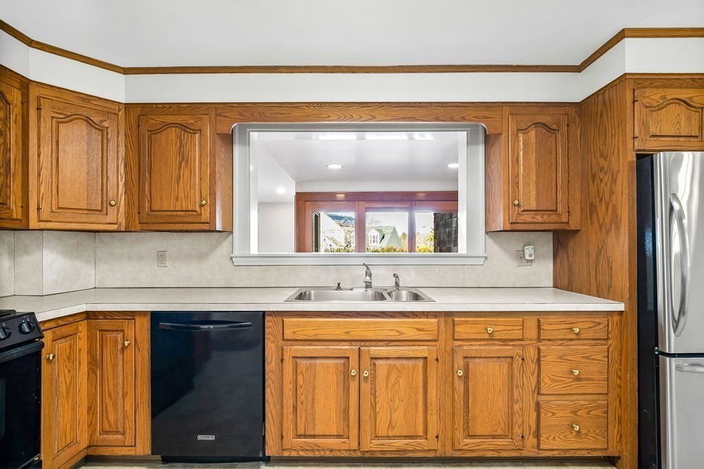 8 Parker Road Winchester, MA 01890 - Photo 15 of 37 a bathroom with a sink and a mirror