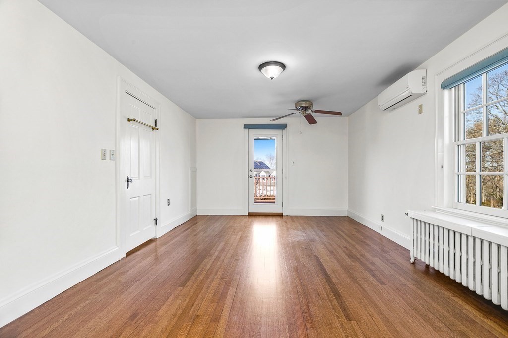 8 Parker Road Winchester, MA 01890 - Photo 19 of 37 wooden floor in an empty room with a window