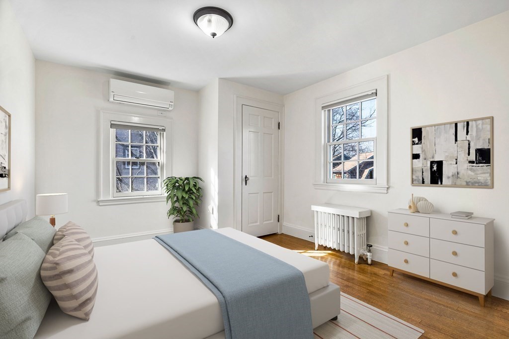 8 Parker Road Winchester, MA 01890 - Photo 22 of 37 a bedroom with a bed and a window