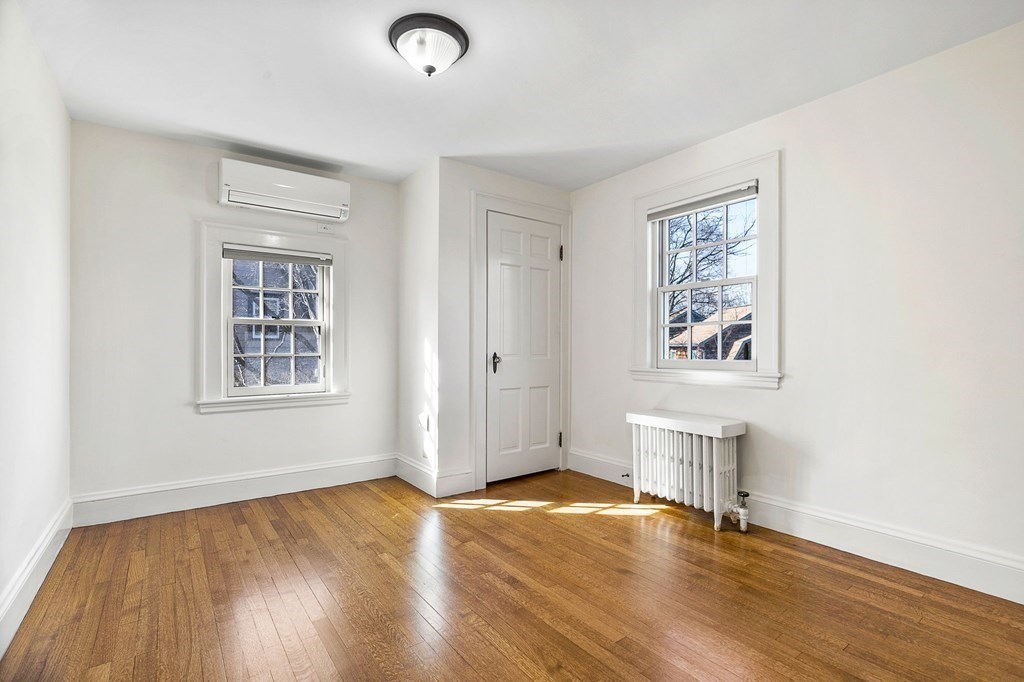 8 Parker Road Winchester, MA 01890 - Photo 23 of 37 a view of empty room with wooden floor and fan