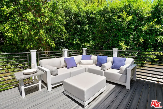 a view of house with a swimming pool