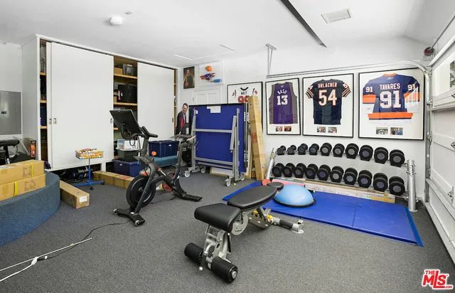 a view of an outdoor sitting area with furniture and backyard