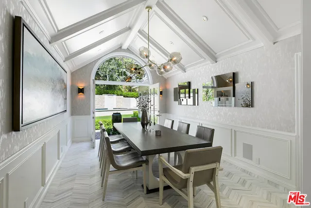 a bathroom with a sink toilet and mirror