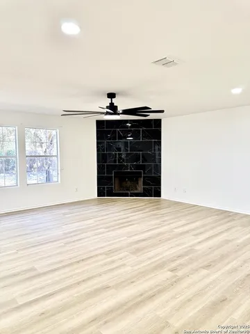 a view of a bedroom with a large window