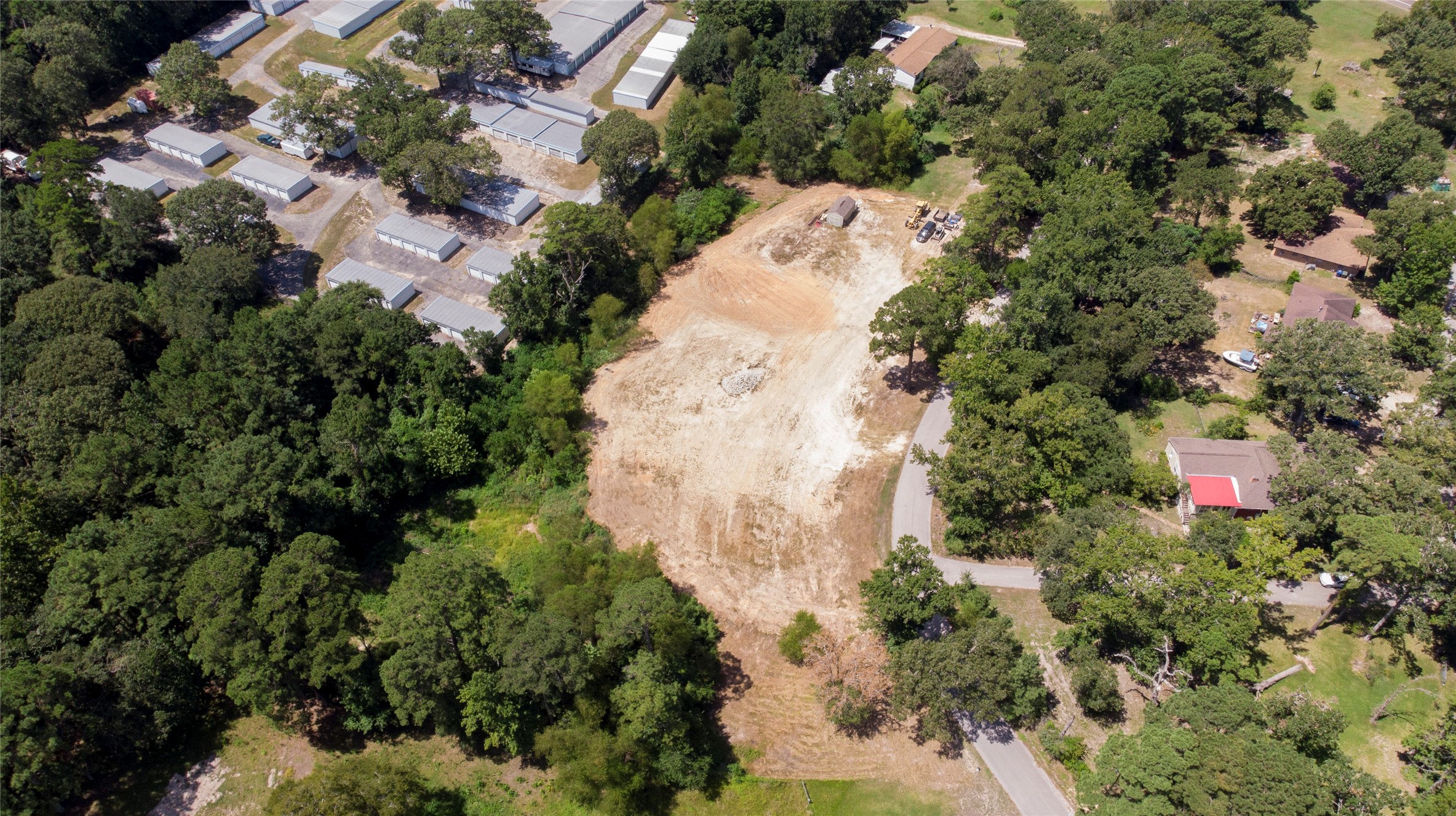 110 Allen Road Huntsville, TX 77320 - Photo 11 of 20 an aerial view of residential house with parking and trees