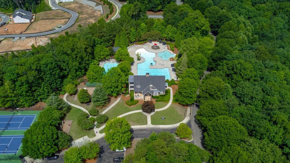 205 Lakeside Place Canton, GA 30114 - Photo 2 of 65 an aerial view of a house with swimming pool and garden