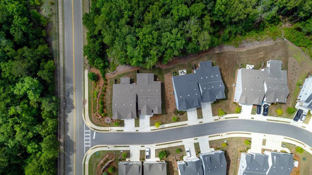 205 Lakeside Place Canton, GA 30114 - Photo 54 of 65 an aerial view of a residential apartment building with a swimming pool