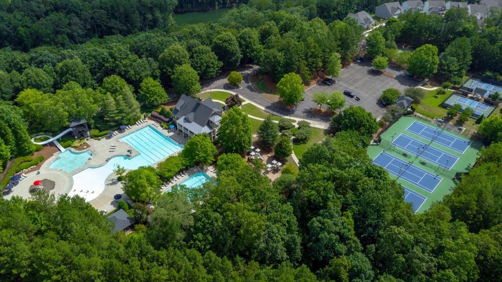 205 Lakeside Place Canton, GA 30114 - Photo 58 of 65 an aerial view of residential house with outdoor space and trees all around