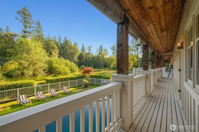 a view of a swimming pool with a yard