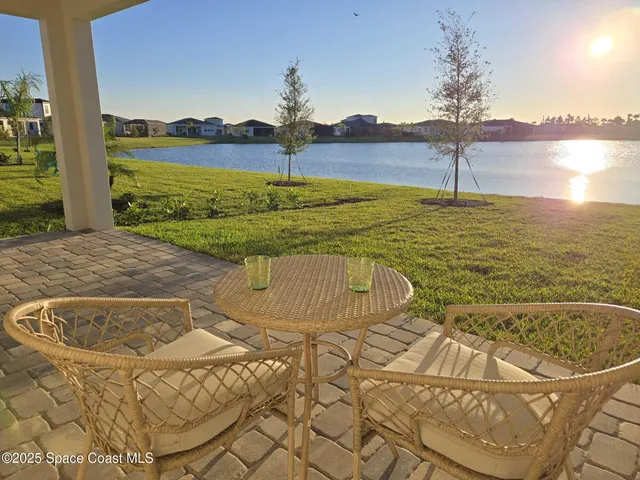 a view of a swimming pool with a lake view