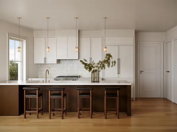 a kitchen with stainless steel appliances granite countertop a sink and cabinets