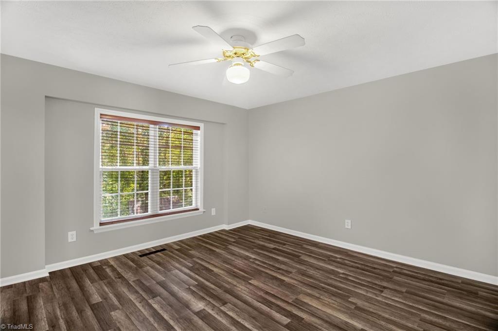 7511 McGee Road Rural Hall, NC 27045 - Photo 15 of 39 Primary Bedroom with new paint & new flooring