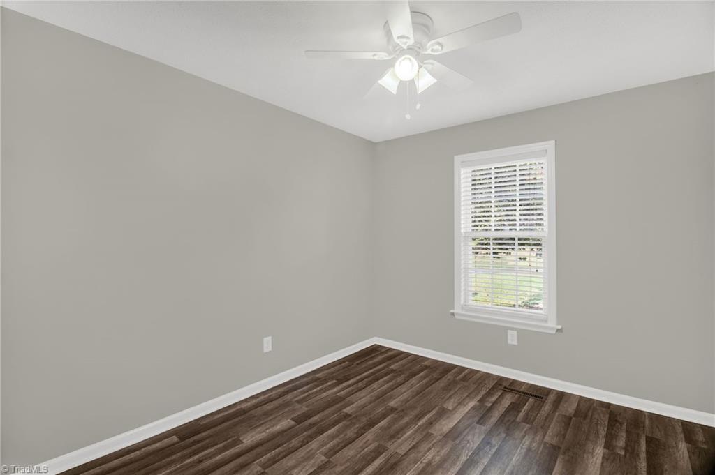 7511 McGee Road Rural Hall, NC 27045 - Photo 18 of 39 Bedroom with new paint & new floor!