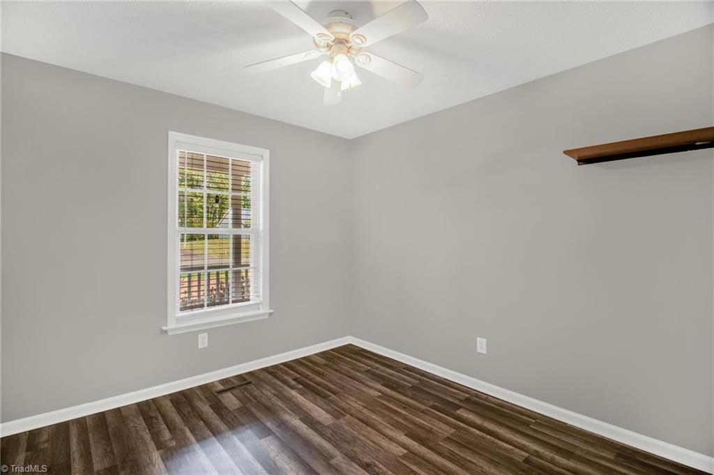 7511 McGee Road Rural Hall, NC 27045 - Photo 19 of 39 Bedroom with new paint & new floor!