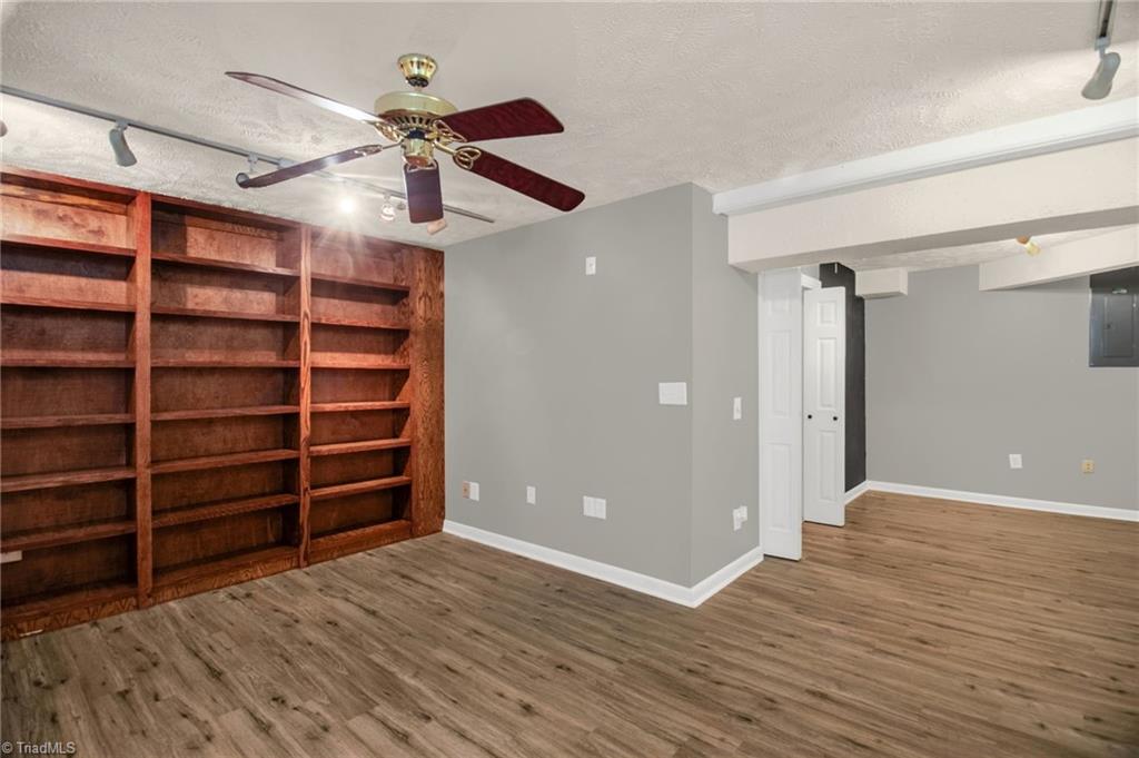 7511 McGee Road Rural Hall, NC 27045 - Photo 22 of 39 Finished basement with built-in shelves