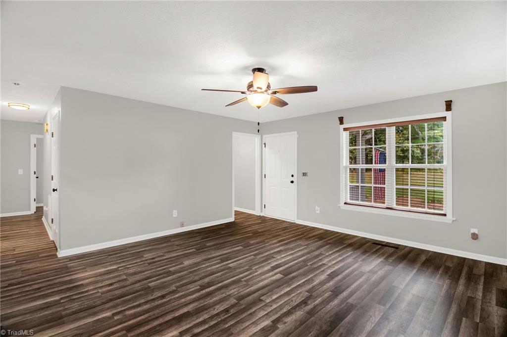7511 McGee Road Rural Hall, NC 27045 - Photo 6 of 39 Living Room with new paint & new flooring!