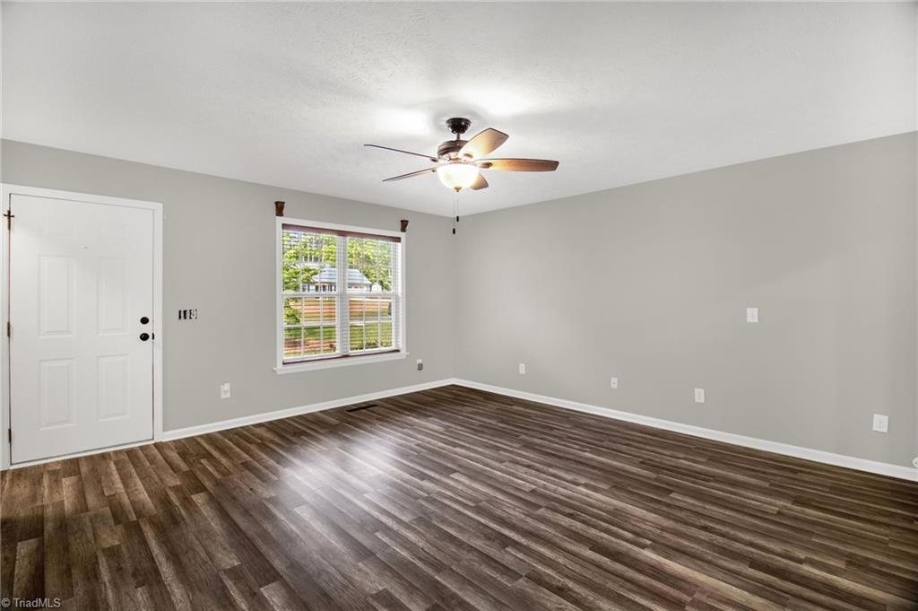 7511 McGee Road Rural Hall, NC 27045 - Photo 7 of 39 Living Room, new paint & new flooring!