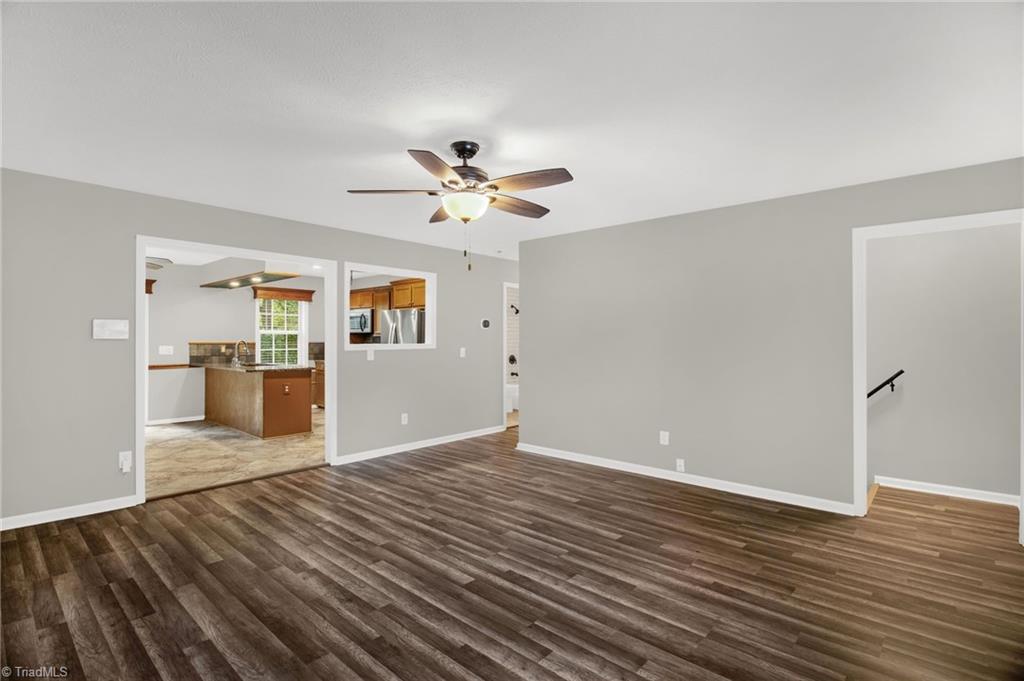 7511 McGee Road Rural Hall, NC 27045 - Photo 8 of 39 Living Room, new paint & new floor!