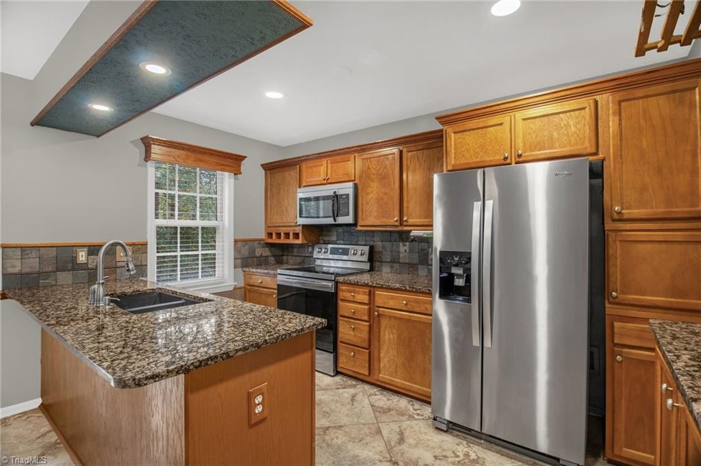 7511 McGee Road Rural Hall, NC 27045 - Photo 9 of 39 Kitchen with new paint & SS appliances!