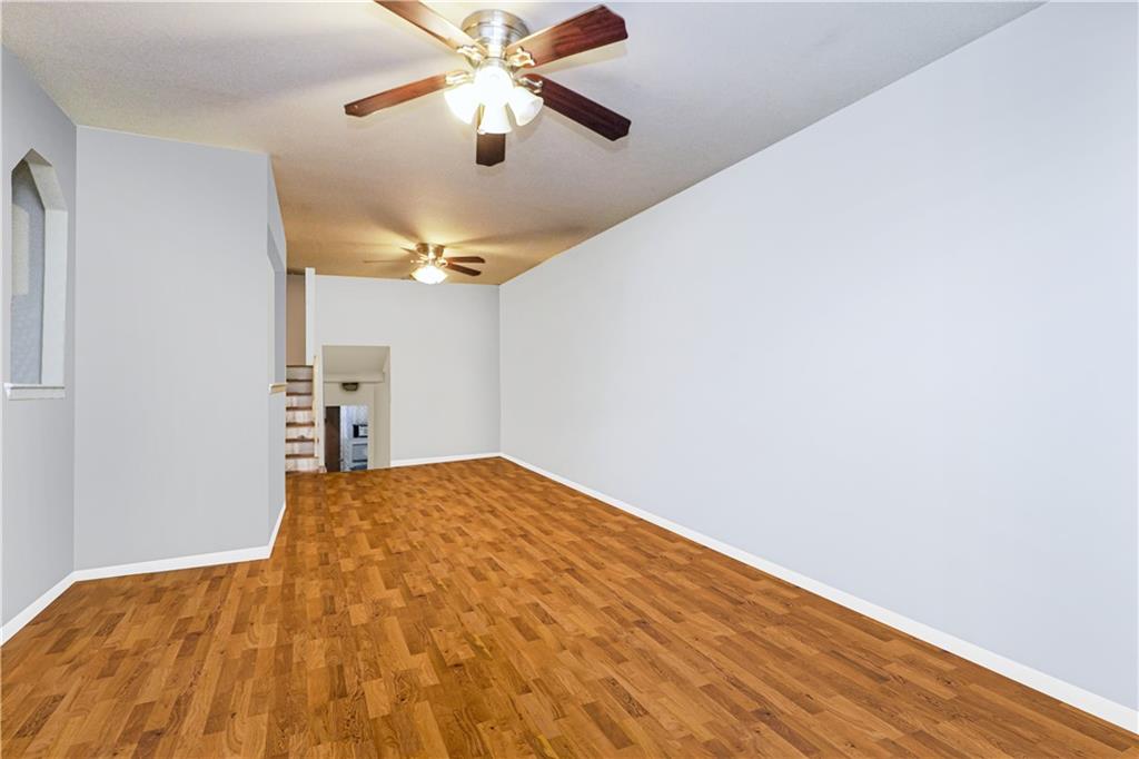 4 Ave Y Brooklyn, NY 11214 - Photo 6 of 25 a view of empty room with wooden floor