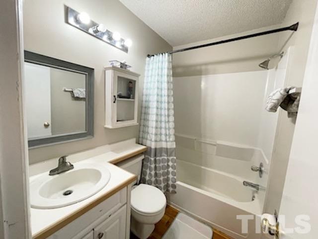 1020 Reca Road Garner, NC 27529 - Photo 11 of 20 a bathroom with a sink a toilet and shower