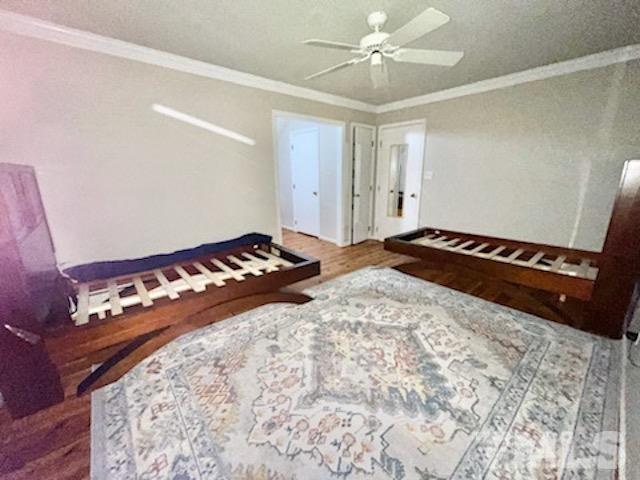 1020 Reca Road Garner, NC 27529 - Photo 15 of 20 a bedroom with a bed and a dresser