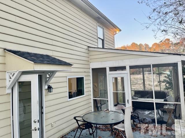 1020 Reca Road Garner, NC 27529 - Photo 18 of 20 a view of a house with a dining table and chairs