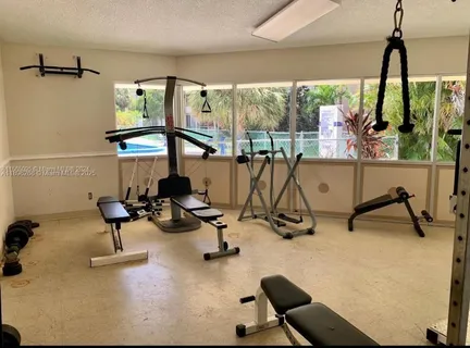 a view of a room with gym equipment