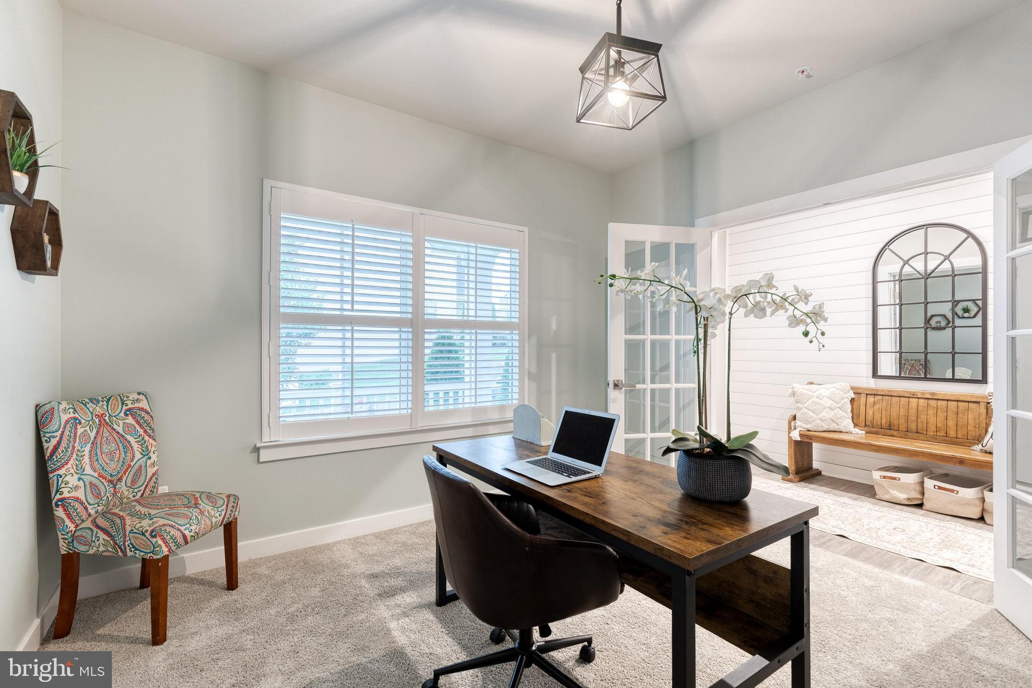 6003 Valentine Way Hanover, MD 21076 - Photo 25 of 52 a view of a workspace with furniture and a window