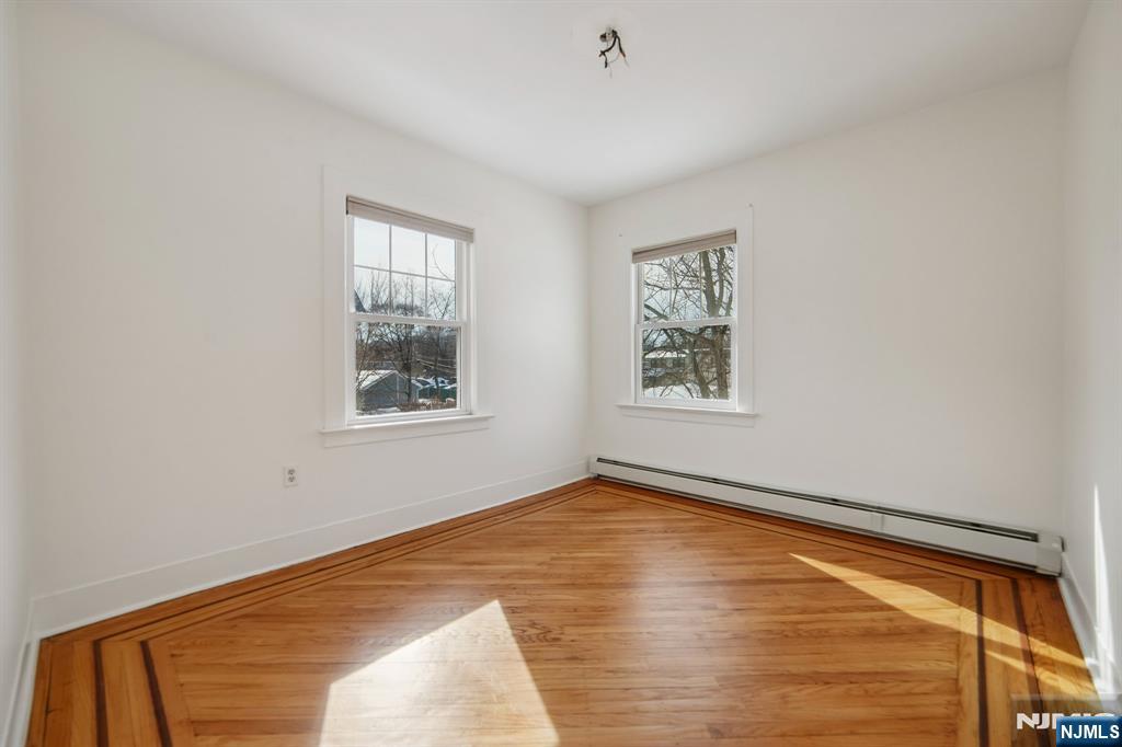 42 Brookfield Road, Unit 2 Montclair, NJ 07043 - Photo 18 of 36 a view of empty room with window