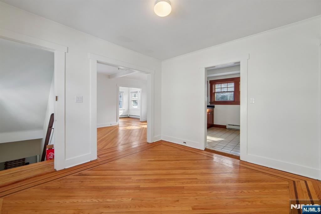 42 Brookfield Road, Unit 2 Montclair, NJ 07043 - Photo 3 of 36 a view of empty room with wooden floor