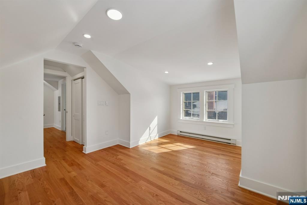 42 Brookfield Road, Unit 2 Montclair, NJ 07043 - Photo 34 of 36 a view of empty room with wooden floor and fan