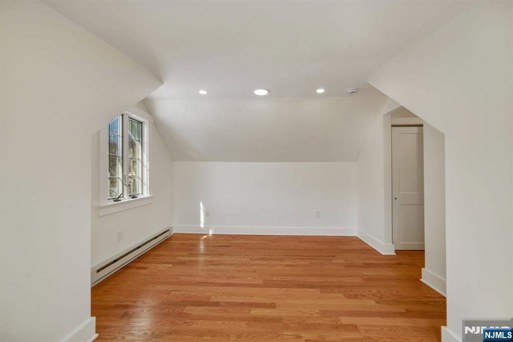 42 Brookfield Road, Unit 2 Montclair, NJ 07043 - Photo 35 of 36 a view of empty room with wooden floor