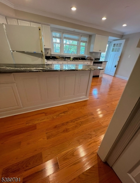 45 Lakeside Drive South Piscataway, NJ 08854 - Photo 3 of 8 a kitchen with stainless steel appliances granite countertop a sink and cabinets