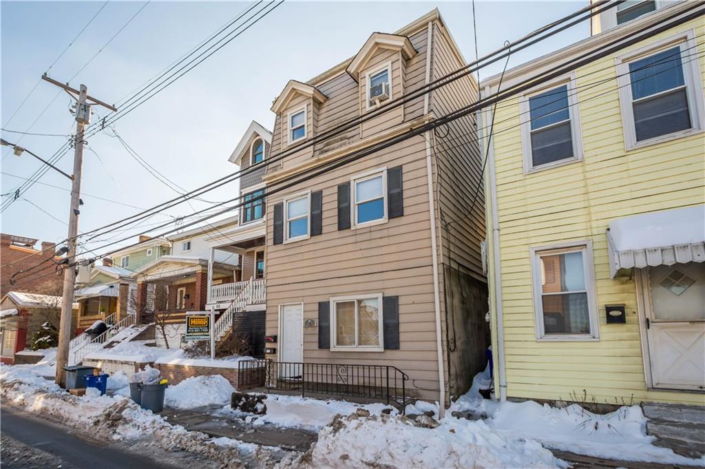 108 Pius Street Pittsburgh, PA 15203 - Photo 2 of 35 a front view of a house