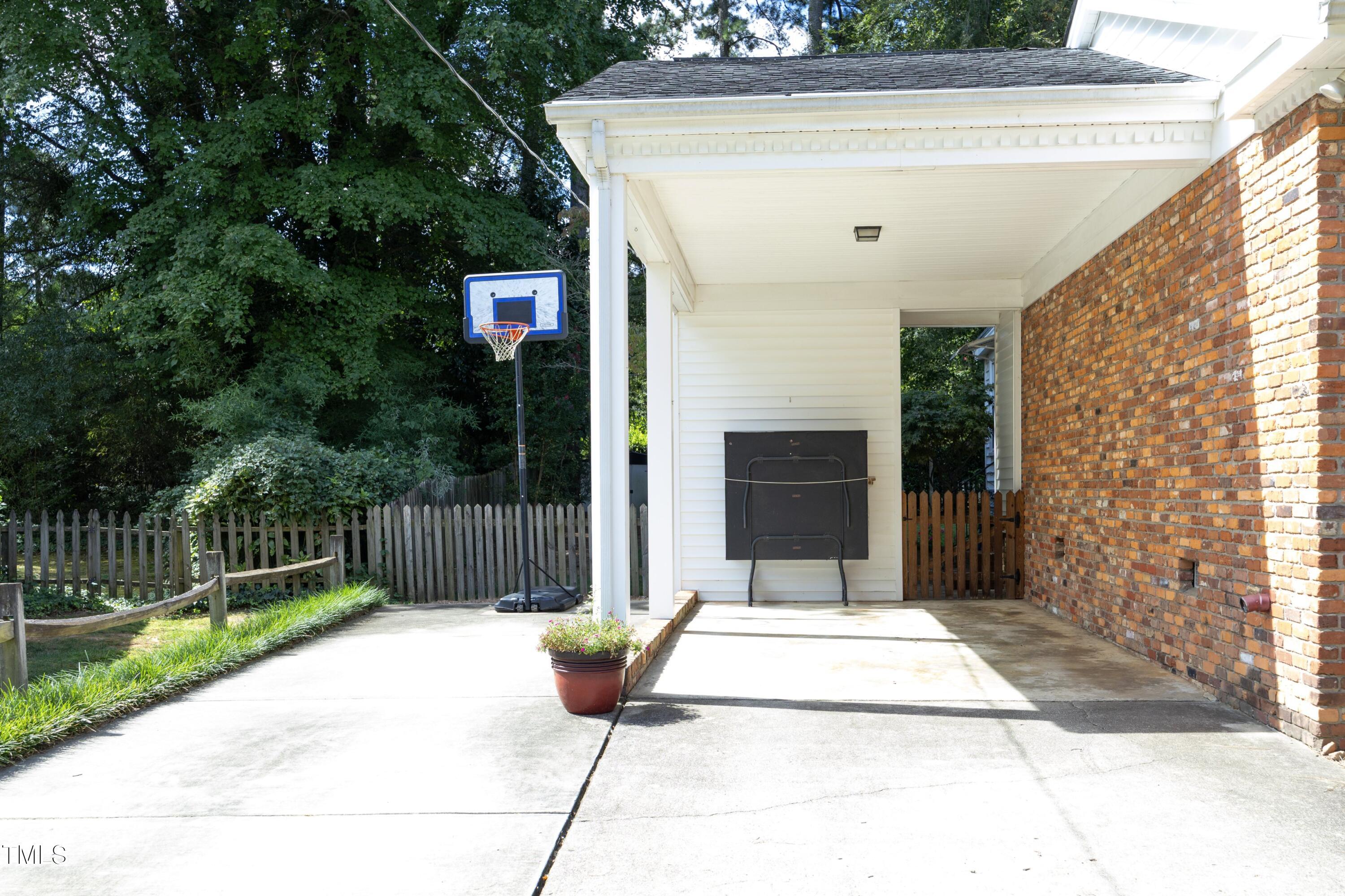 1028 Cedarhurst Drive Raleigh, NC 27609 - Photo 5 of 48 05Carport