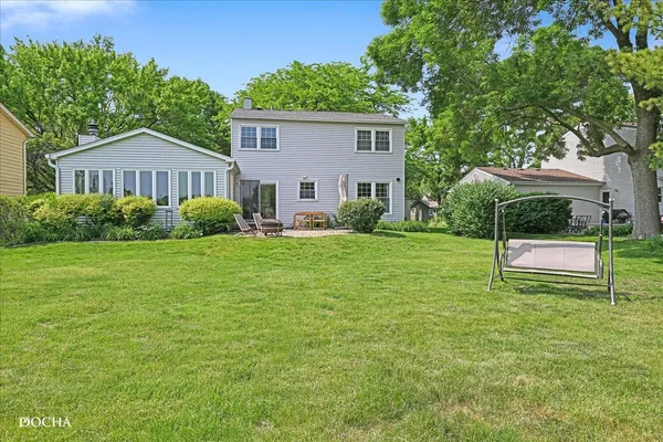 a view of a golf course with a lake view