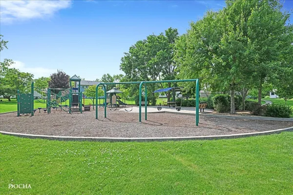 a view of a park with swings