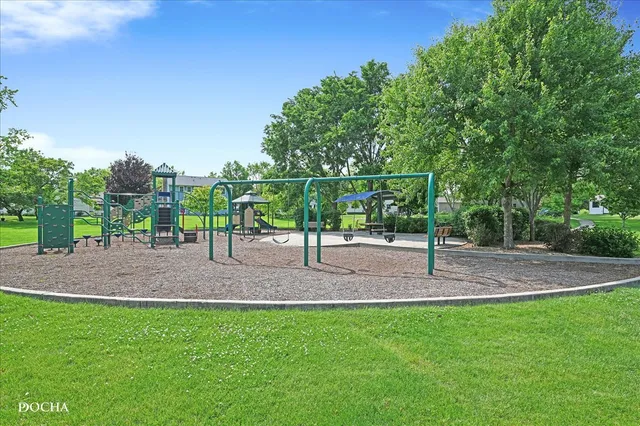 a view of a park with swings