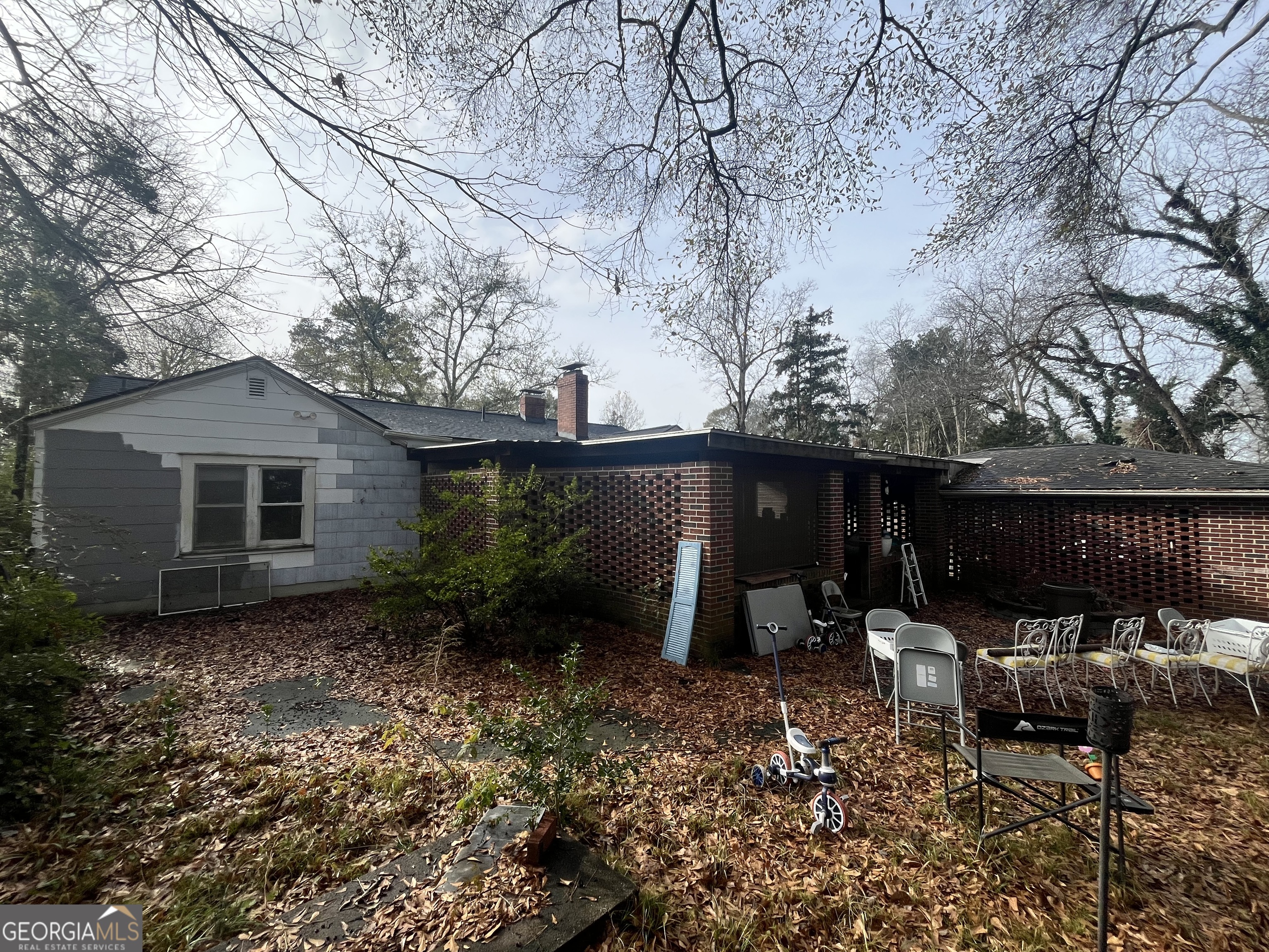 109 Schaefer Court Toccoa, GA 30577 - Photo 28 of 28 a backyard of a house with table and chairs