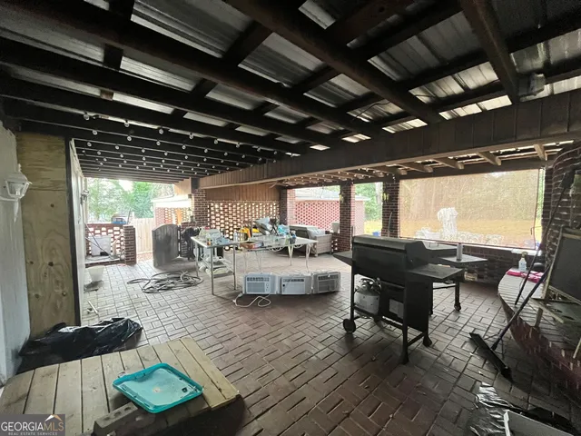 a outdoor space with lots of tables and chairs